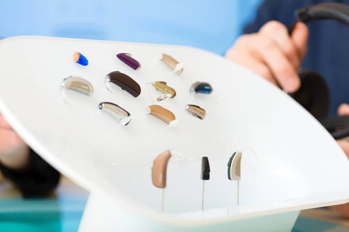 different types of hearing aids presented to a patient